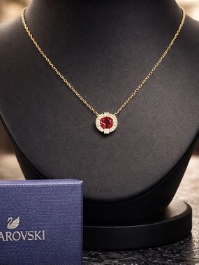 Swarovski Gold-Tone Necklace with Deep Red Crystal Pendant